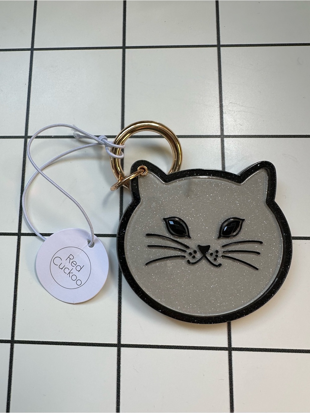 Cat mirror key chain. Grey glittery cat-shaped keychain mirror w/ gold key-ring